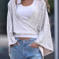Tied Sequin Surplice Flare Sleeve Blouse