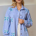 Double Take Full Size Sequin Bow Button Up Shacket