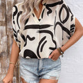 Perfee Printed Notched Half Sleeve Blouse