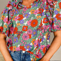 Ruffled Printed Tie Neck Short Sleeve Blouse