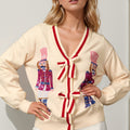 Double Take Full Size Nutcracker Sequin Bow Decor Cardigan